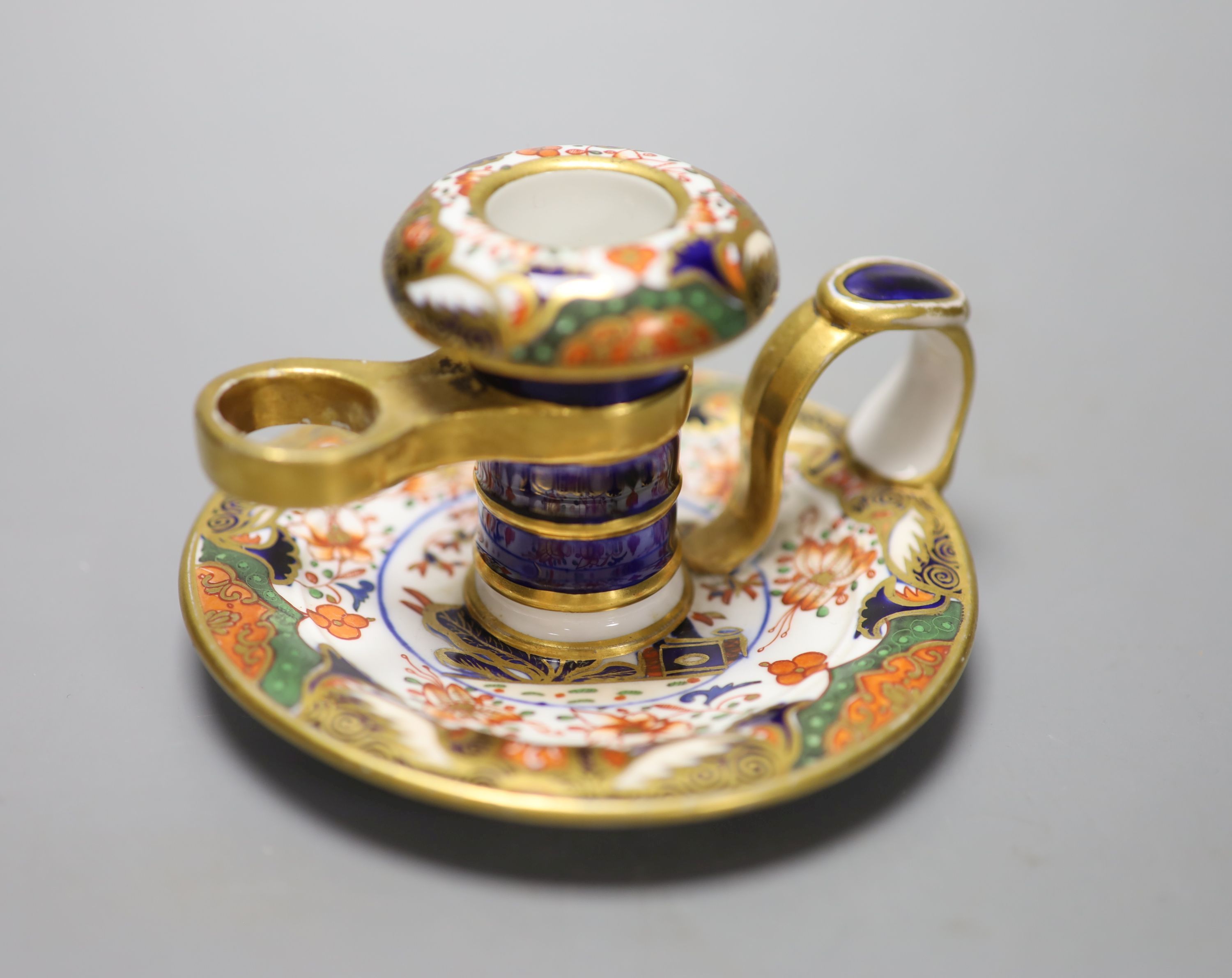A Spode chamberstick painted with imari pattern 967, Spode mark in red c.1815, height 7cm